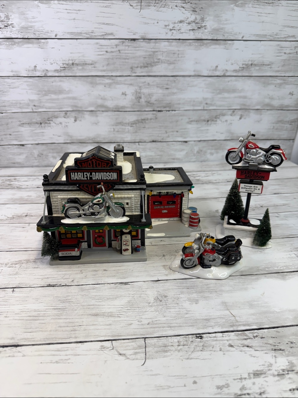 Department 56 Snow Village Harley-Davidson Motorcycle Shop, Sign and hogs read
